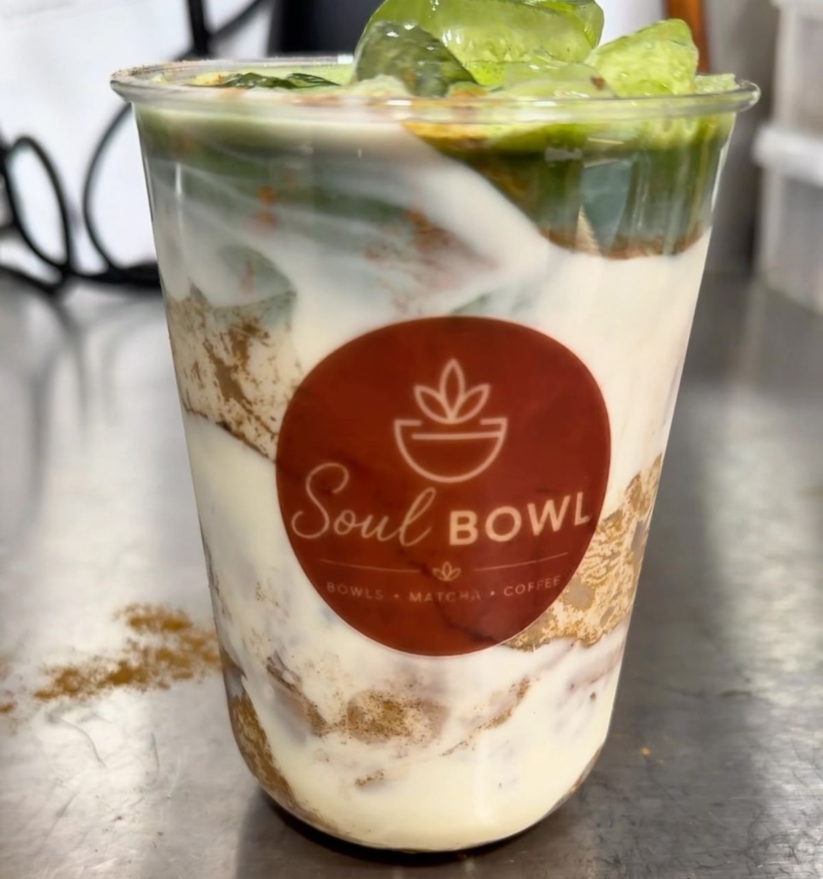 An iced matcha drink with cinnamon